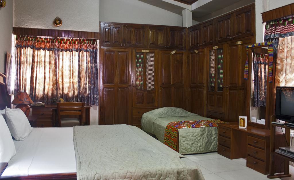 Four Villages Inn Kumasi Zimmer foto