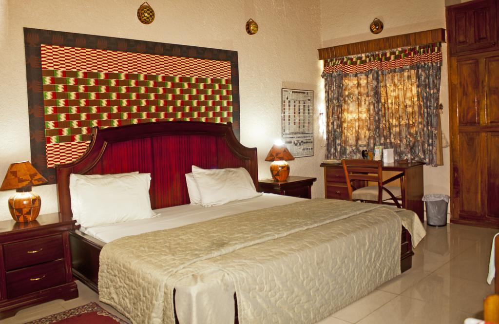 Four Villages Inn Kumasi Zimmer foto