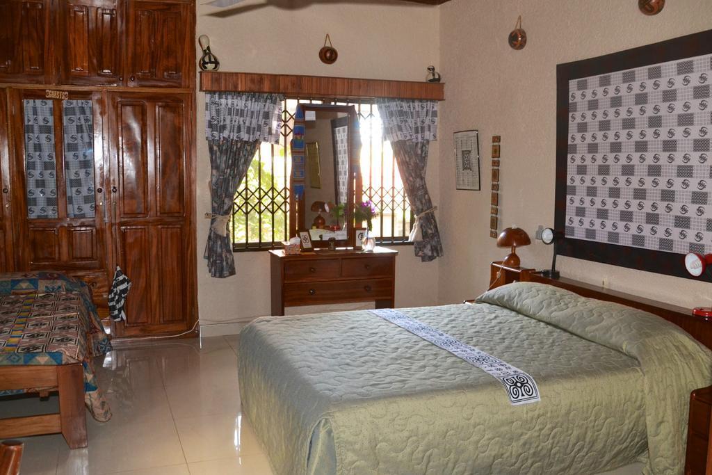Four Villages Inn Kumasi Zimmer foto